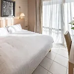 Excelsuites Hotell